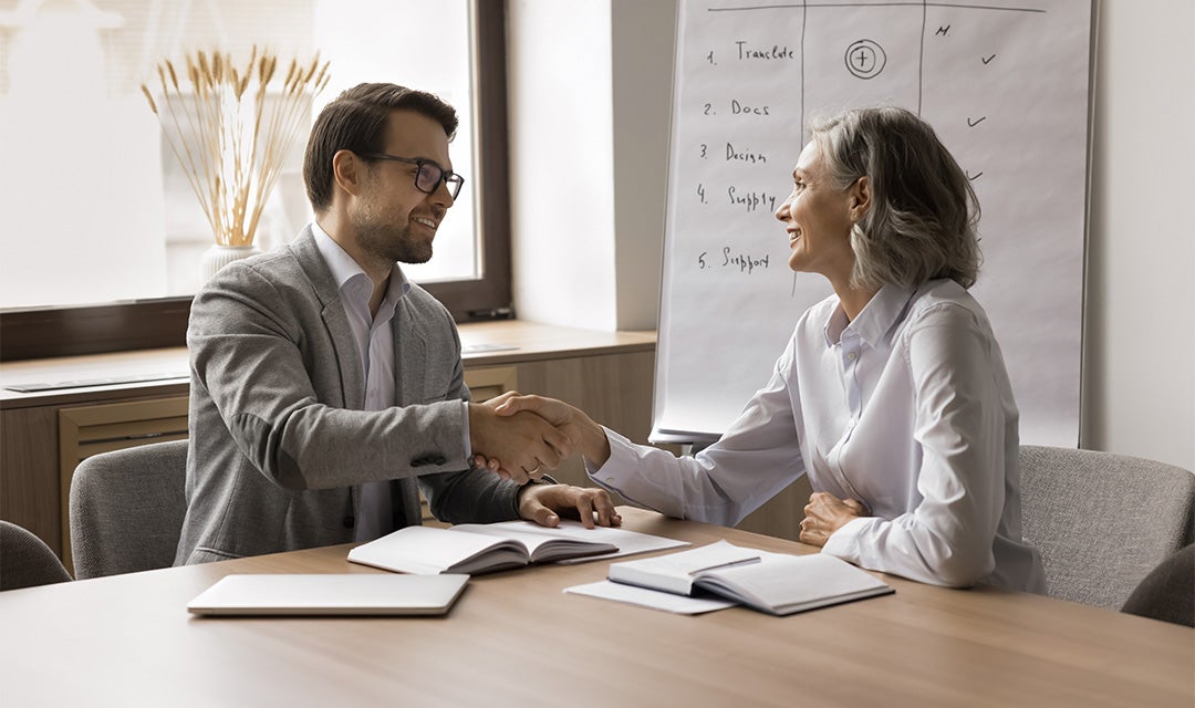 Human Resource Managers shaking hands